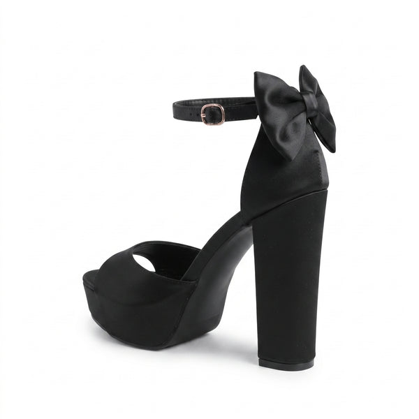 ZAPATILLA ELEGANTE NEGRA CON TACÓN GRUESO Y MOÑO (MOD 7120)