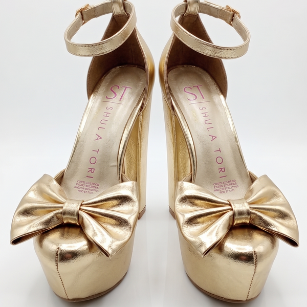 ZAPATILLA ORO CON MOÑO DE TACÓN GRUESO Y PLATAFORMA (MOD 1000)