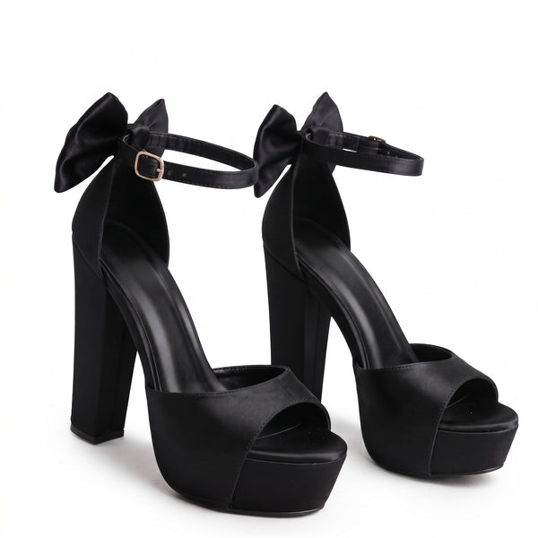 ZAPATILLA ELEGANTE NEGRA CON TACÓN GRUESO Y MOÑO (MOD 7120)